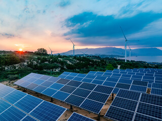 Solar photovoltaic windmill wind energy at sunset