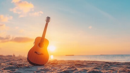 summer concept. Guitar on the beach during a vibrant sunset.