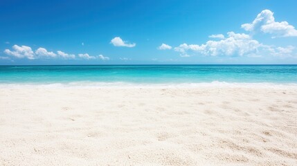 Obraz premium summer concept. Serene beach under a clear blue sky with turquoise water.