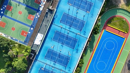 Aerial View of Recreational Sports Complex: Basketball Court, Tennis Court, and Inline Skating...