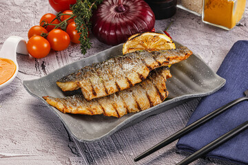 Grilled seabass fillet with lemon
