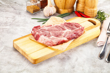 Raw pork neck steak for grill