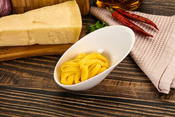 Yellow cheese sauce in the bowl
