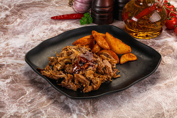 Baked shredded pork with potato