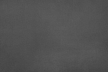 Fototapeta premium Detailed view of a dark gray fabric with a subtle texture, great for backgrounds and textures.