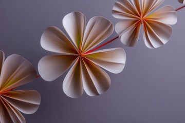 Origami flowers on a string