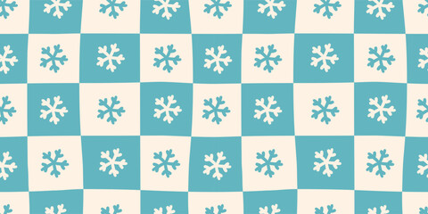 Seamless abstract modern cute winter Christmas pattern, snowflakes background on checkered background; blue and white colors; hand drawn vector illustration, flat style