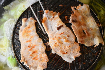 pork barbecue on frying pan, Thai style cuisine