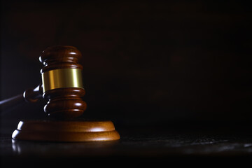 Judges gavel on wooden desk. Law firm concept.