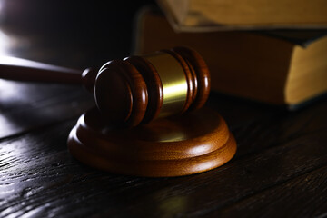 Judges gavel on wooden desk. Law firm concept.