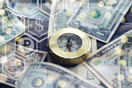 Magnetic compass. The concept of finding successful solutions to problems. Compass, map, sleeves, hands.