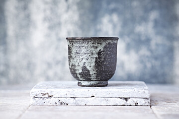 Tea culture. Traditional, handcrafted ceramic on stone background.	
