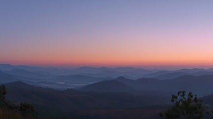 Fototapeta premium Mountain sunrise in calm nature, a moment of peace and serenity 