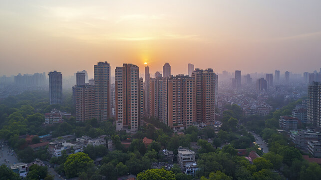 Aerial view of high rise buildings sunset cityscape, showcasing urban development and nature