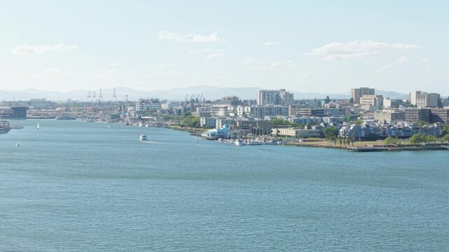 A rotating aerial pan of the Oakland shoreline with Downtown Oakland in the distance. Shot in 4K on a DJI Air 3S.