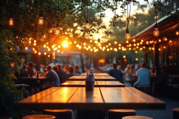 Outdoor evening scene at a cozy restaurant or cafe with wooden tables and hanging warm string lights surrounded by greenery, people socializing in relaxed atmosphere