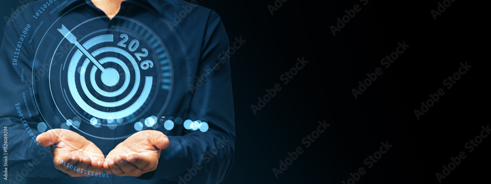 Poster businessman holding futuristic 2026 target interface in hands on dark background with blue digital l