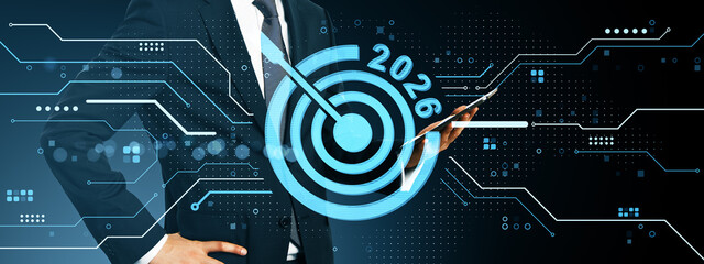 Businessman holding smartphone with 2026 digital target overlay on virtual interface background...