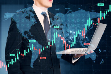 Businessman analyzing global forex market with financial charts and buy-sell signals over digital world map background using a laptop screen display.