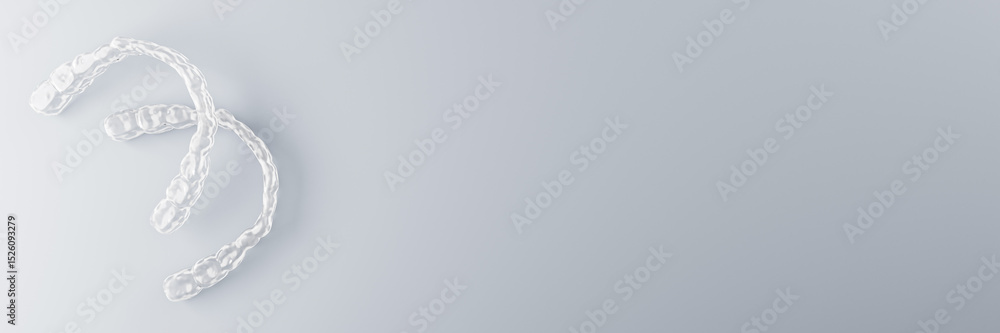 Poster clear dental aligners on gradient background with copy space for medical design or orthodontic treat