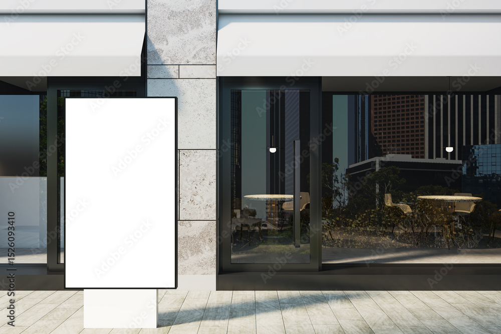 Poster blank vertical lightbox billboard in front of modern store facade with large glass windows and city 