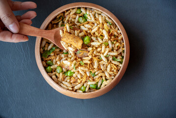 A bowl of rice with a spoon in it