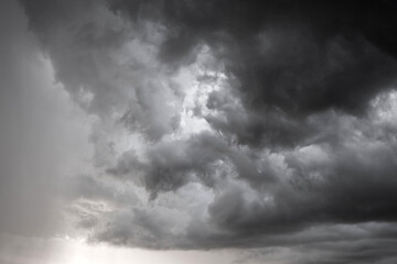 dark clouds make sky in black. Heavy rain thunderstorm. Pattern of clouds overcast predict tornado, Hurricane or thunderstorm and rainy. Dark sky cloudy have storm and lightning thunderbolt.