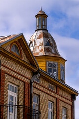 Ancient old wooden houses in Latvia in Kuldiga, 2025.