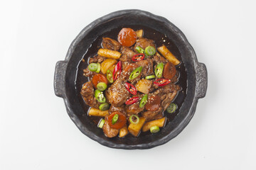  Jjimdak is a dish made by simmering chicken pieces with carrots, potatoes, garlic, peppers, green onions, onions, and glass noodles, and seasoning it with soy sauce or red pepper paste.