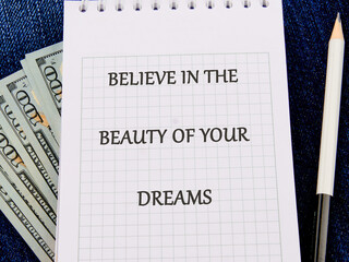 Business and Believe in your Dreams concept. Copy space. Concept words BELIEVE IN THE BEAUTY OF...