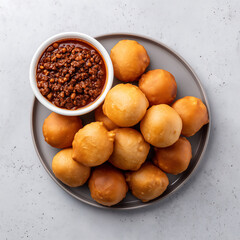 Classic South African Cuisine - Wetkoek - fatty, deep-fried bread, usually stuffed with minced meat top view