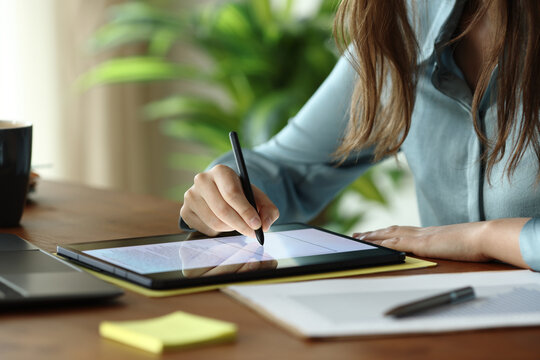 Employee working handwriting on digital tablet