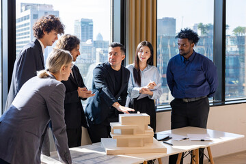Team of architect, engineer and businessman having meeting on new property and real estate development project over the design and safety for modern living space in urban downtown