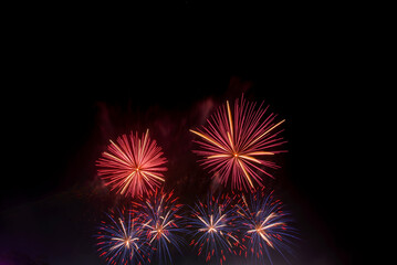 Firework celebrate an American National Day anniversary party in night background. Beautiful Fireworks Concept.