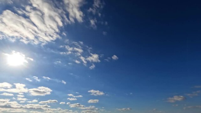 beautiful timelapse of the sky of fluffy clouds - natural background