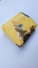 Mozzarella cheese that has become moldy due to improper storage or being expired is no longer...
