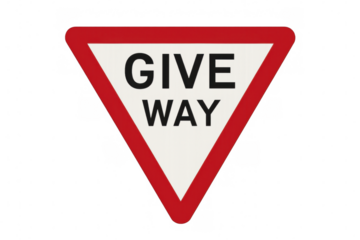 Red and white triangular traffic sign indicating drivers to give way, promoting road safety and traffic regulations on a transparent background