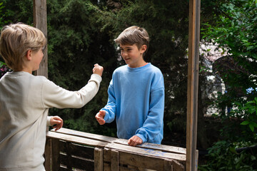 Two children playing at open-air markets