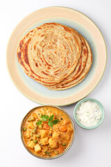 Vegetable Kurma and paratha or malabar parota