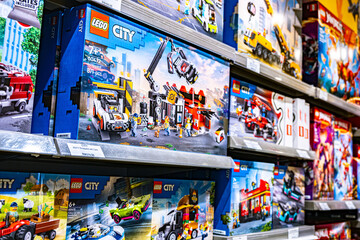 Obraz premium Sets of Lego construction toys displayed on store shelves