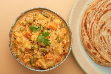 Vegetable Kurma and paratha or malabar parota