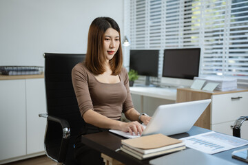 Women are sitting searching for information at home office.