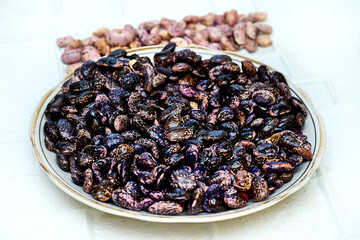 Uncooked black and pink speckled beans, ready to cook