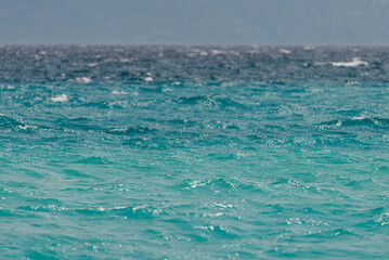 Obraz premium Beautiful turquoise and blue, wavy sea texture