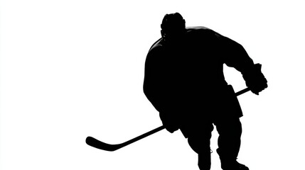 Fototapeta premium A hockey player is holding a hockey stick and a hockey puck