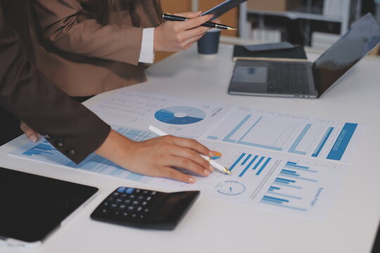 Accounting company provide finance and taxation planning for profitable cash flow, Auditor and accountant team working in office, analyze financial data and accounting record with calculator.Insight