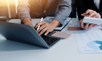 Accounting company provide finance and taxation planning for profitable cash flow, Auditor and accountant team working in office, analyze financial data and accounting record with calculator.Insight