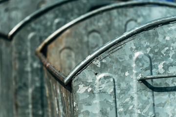 Metallic garbage container on the street