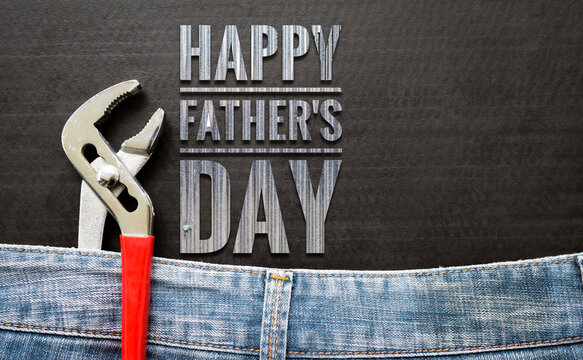 Happy Father's day banner with Slip joint Pliers on blue jean over black background, Father's day poster background idea