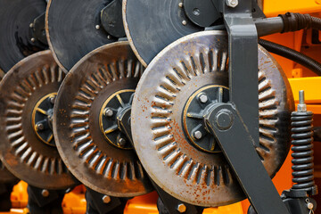 Agricultural tractor harrowing equipment, closeup